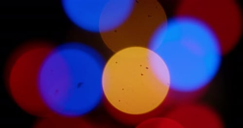 Colorful Lights Out of Focus on Black Background