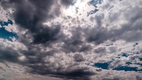 Timelapse of Puffy Clouds Moving in the Blue Sky Cloud Space