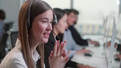 Business Professionals Providing Tech Support in the Office