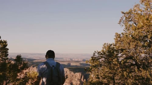 Slow Motion Happy Young Tourist Man with Backpack Hiking, Enjoying Epic Summer Sunset Panoramic View