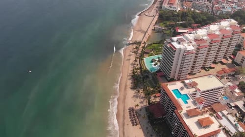Aerial footage of the beautiful beach and town of Puerto Vallarta in Mexico