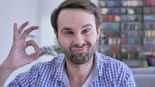 Okay Sign By Casual Beard Man in Office