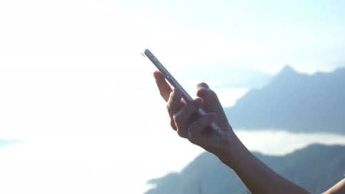 Touch Screen On Smartphone At Mountain