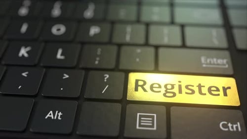 Clavier d'ordinateur noir et touche de registre dorée
