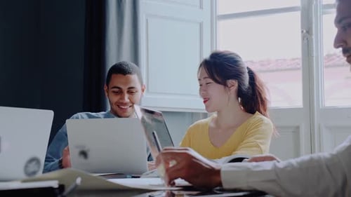 Group of creative people working together in the office