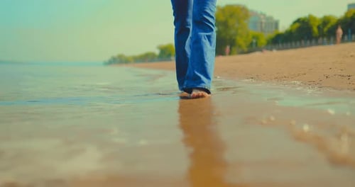 Walking Barefoot on Beach Water's Edge