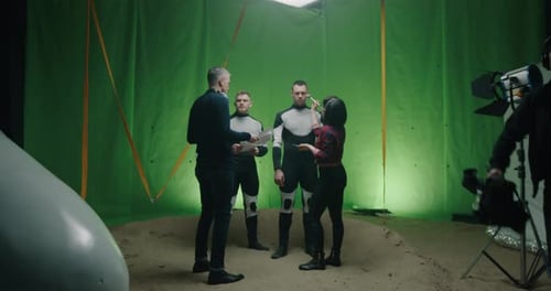 Movie Set with Astronauts in Front of Green Screen