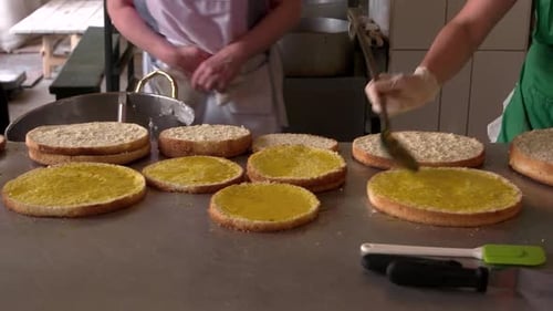 Baker Prepares Delicious Sponge Cake Layers