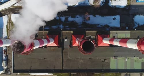 Thermal Power Plant. Steam Is Going Out of Pipes. Aerial Top-down View