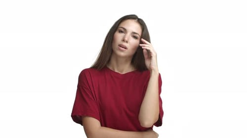 Attractive Brunette Girl in Red Tshirt Looking Annoyed Roll Her Eyes and Exhaling Bothered Standing