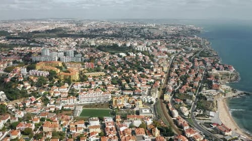 A Seaside City with Fisherman Skiffs Bobbing About on a Harbor