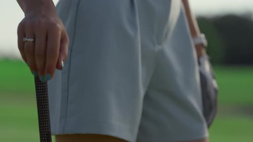 Sporty Woman Stand Outside on Golf Course