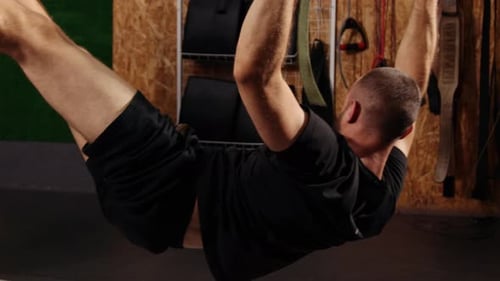 Men Training Arms with Trx Fitness Straps in Gym Doing Push Ups in the Air Train Upper Body Chest