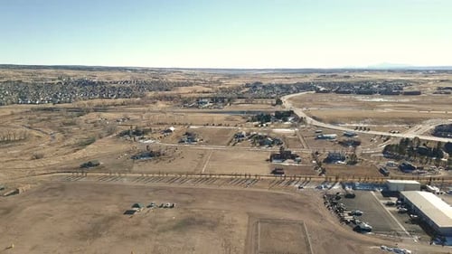 Aerial View of Houses and Open Fields