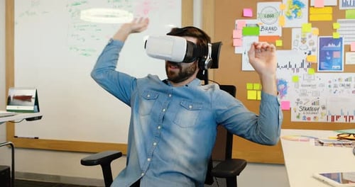 Man Experiences Virtual Reality in Office Setting