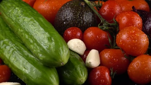 Fresh Cucumbers, Tomatoes, Avocado, and Garlic