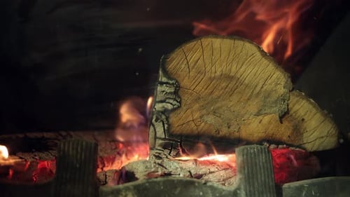 Cozy Wood Fire Burning in a Fireplace