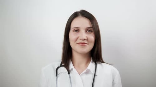 Female Doctor Smiling at Camera Close Up