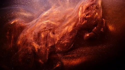 Abstract Bronze Paint . Shooting on a Black Background.
