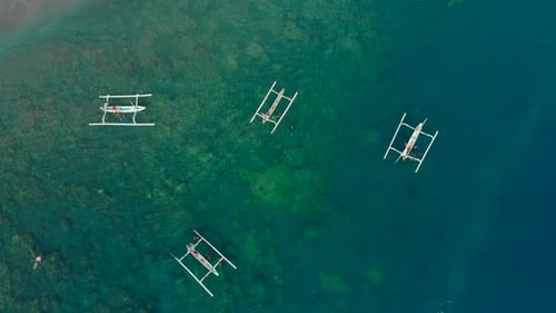 Aerial Shot of a Fishing Boats That Bring Divers To the Diving Spots on a Tropical Island