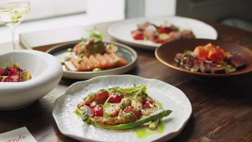 Set Table with Gourmet High Kitchen Dinner Plates and Dishes at the Restaurant