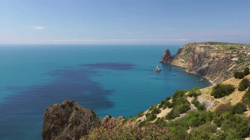 Aerial Panoramic View of Seascape with Crystal Clear Azure Sea and Rocky Shores