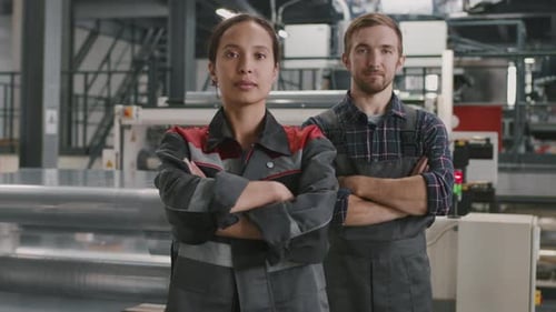 Portrait Of Multi-Ethnic Engineers At Plant