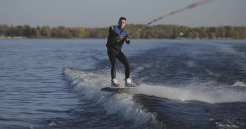 Wakeboarder Falling in Water