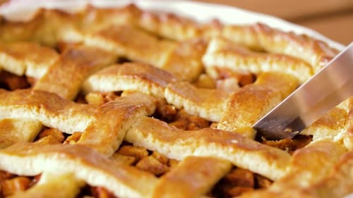 Close Up of Apple Pie Slicing By Knife 22