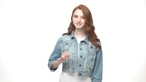 Closeup Portrait of Casual Teen Girl in Denim Concentrated Counting Fingers Feeling Content and