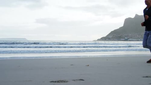 Man running on the beach