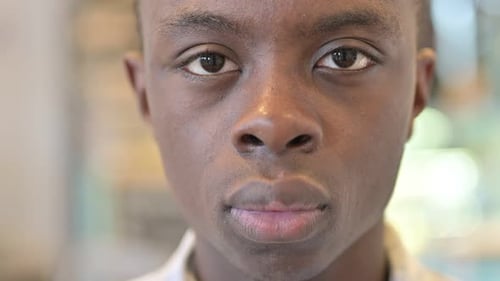 Face Close up of African Man Looking at Camera