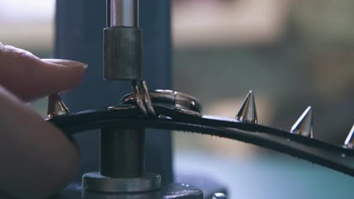 Spiked Collar Being Made With Press Machine