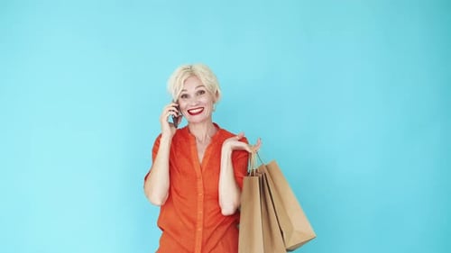 Mobile Communication Inspired Woman Shopping