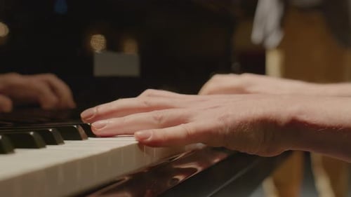 Hands Play Piano with Violin Accompaniment