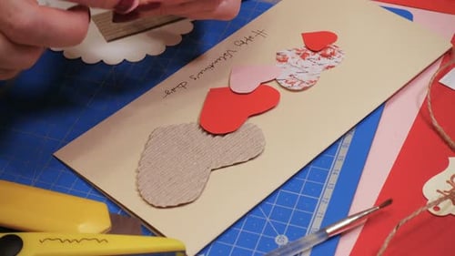 Woman Making Homemade Valentines Day Card