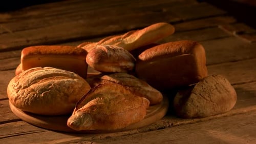 Assorted Rustic Bread on a Wooden Cutting Board