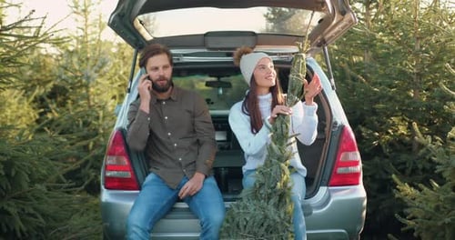 Couple Chooses Christmas Tree on Farm