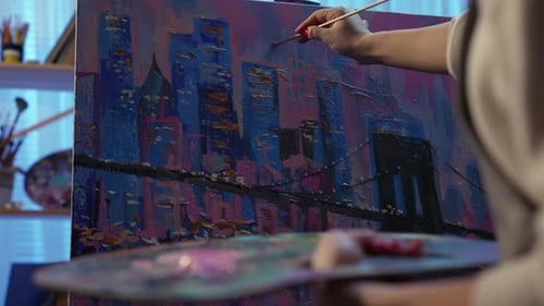 Painting Abstract City on Canvas in Art Studio