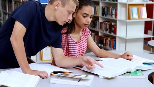 Attentive students studying in library