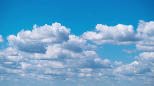 Time Lapse of Clouds Moving in Blue Sky