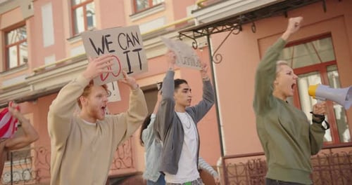 People Marching and Protesting in the City