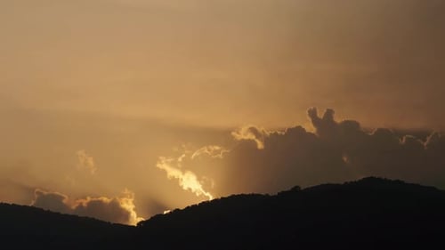 Golden Sunrise over Mountain Peaks Time Lapse