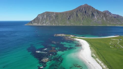 Flight over the sea,view on Flakstad and Skagsanden beach Lofoten Islands, Norway