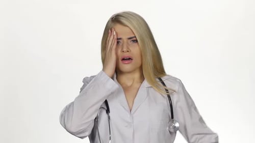 Woman Doctor Reacts with Shock and Disbelief