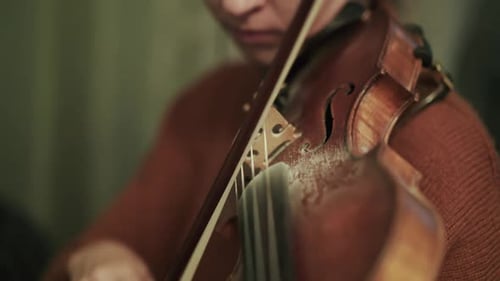 Violinist Performing in Studio with Headphones