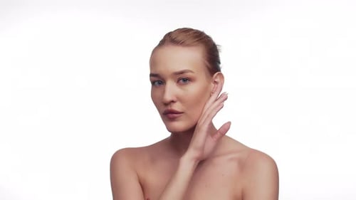 Beautiful Woman Posing in Front of White Background