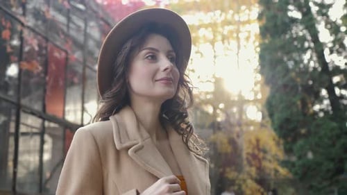 Woman in Autumn Park