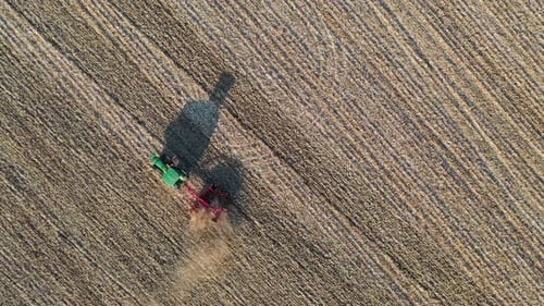 Tractor Plowing Field from Above