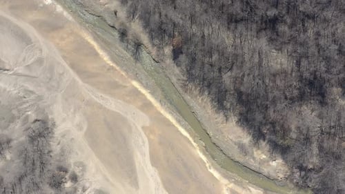 Polluted river area with mine drainage leftovers 4K aerial footage